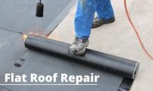 Roofing Services — Repairing of a Flat Roof in Grand Haven, MI