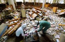 Flood-hit library in Okayama to discard 127,000 damaged books：The Asahi Shimbun