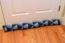 Use A Door Draft Stopper And Avoid Carbon Taxes!