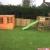 Artificial Plastic Grass Installation In Garden